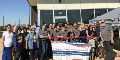 Lemoore Chamber of Commerce members and friends helped welcome Sunny Law and wife Fanny as they opened their new 201 Kitchen in Hanford.